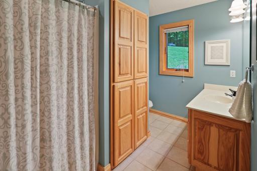 Upper level bathroom with lots of storage. Ceramic tile in all the bathrooms.