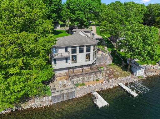150' feet of frontage is hard to find. There is a great area just to the left of the boat house for a nice swimming beach space.
