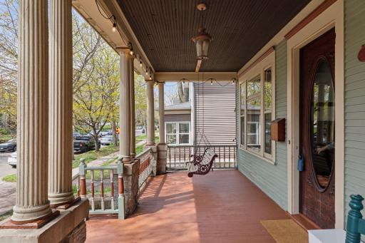 The inviting open front porch greets your arriving guests. This is the ideal place to relax with your morning coffee and enjoy the gentle spring breezes.