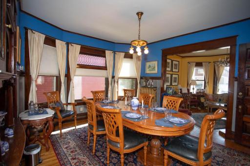 Plenty of natural light from large windows in dining room.