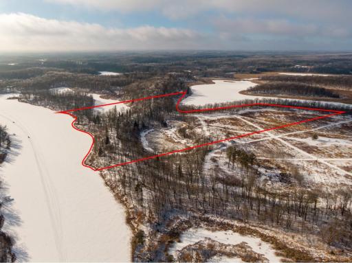 Lot C includes Little Mantrap frontage to the left, shoreline on the interior inlet (accessible), and woods and high grassland.