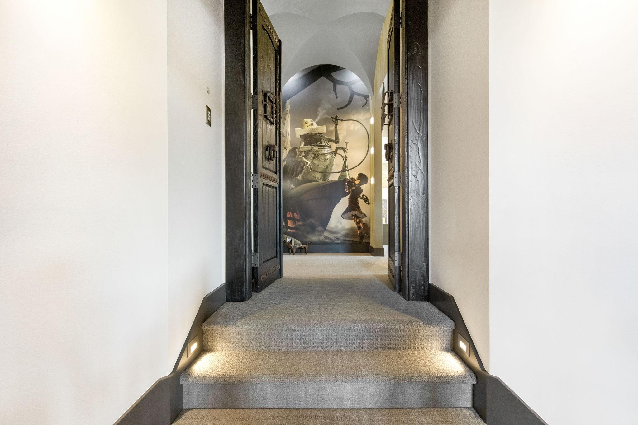 The extraordinary primary wing features a spacious bedroom with stunning views & an adjoining sitting room, an incredible indoor/outdoor hot tub room, an enormous walk-in closet & dressing room, private gym, and luxurious spa-like bathroom.