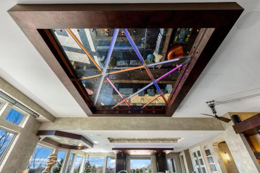 There are custom ceilings in nearly every room with 9â-10â+ ceilings heights on the main and lower levels.