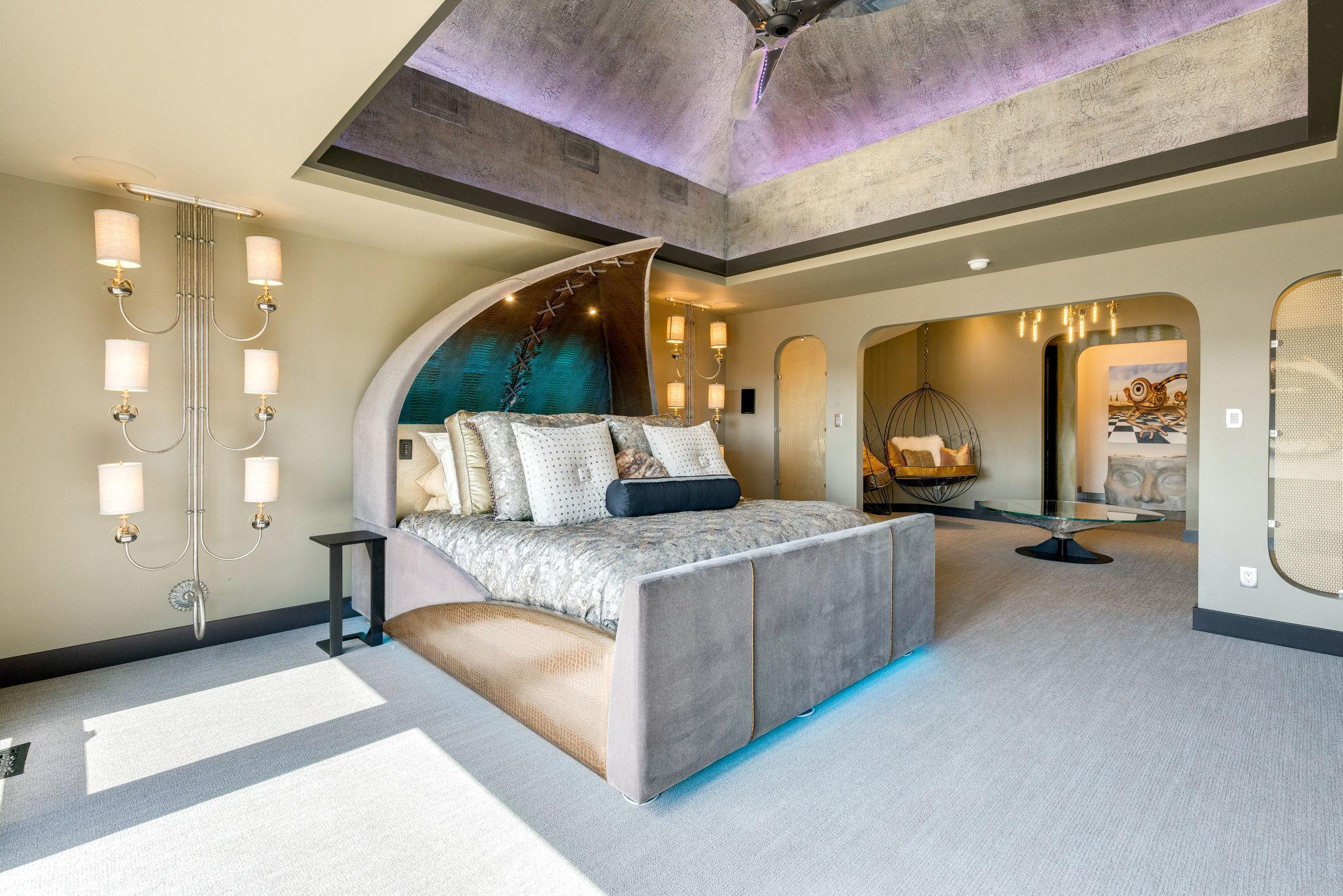 The extraordinary primary wing features a spacious bedroom with stunning views & an adjoining sitting room, an incredible indoor/outdoor hot tub room, an enormous walk-in closet & dressing room, private gym, and luxurious spa-like bathroom.