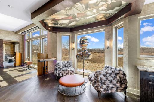Floor to ceiling windows allow natural light into every corner of the home and feature Control4 automated blinds.