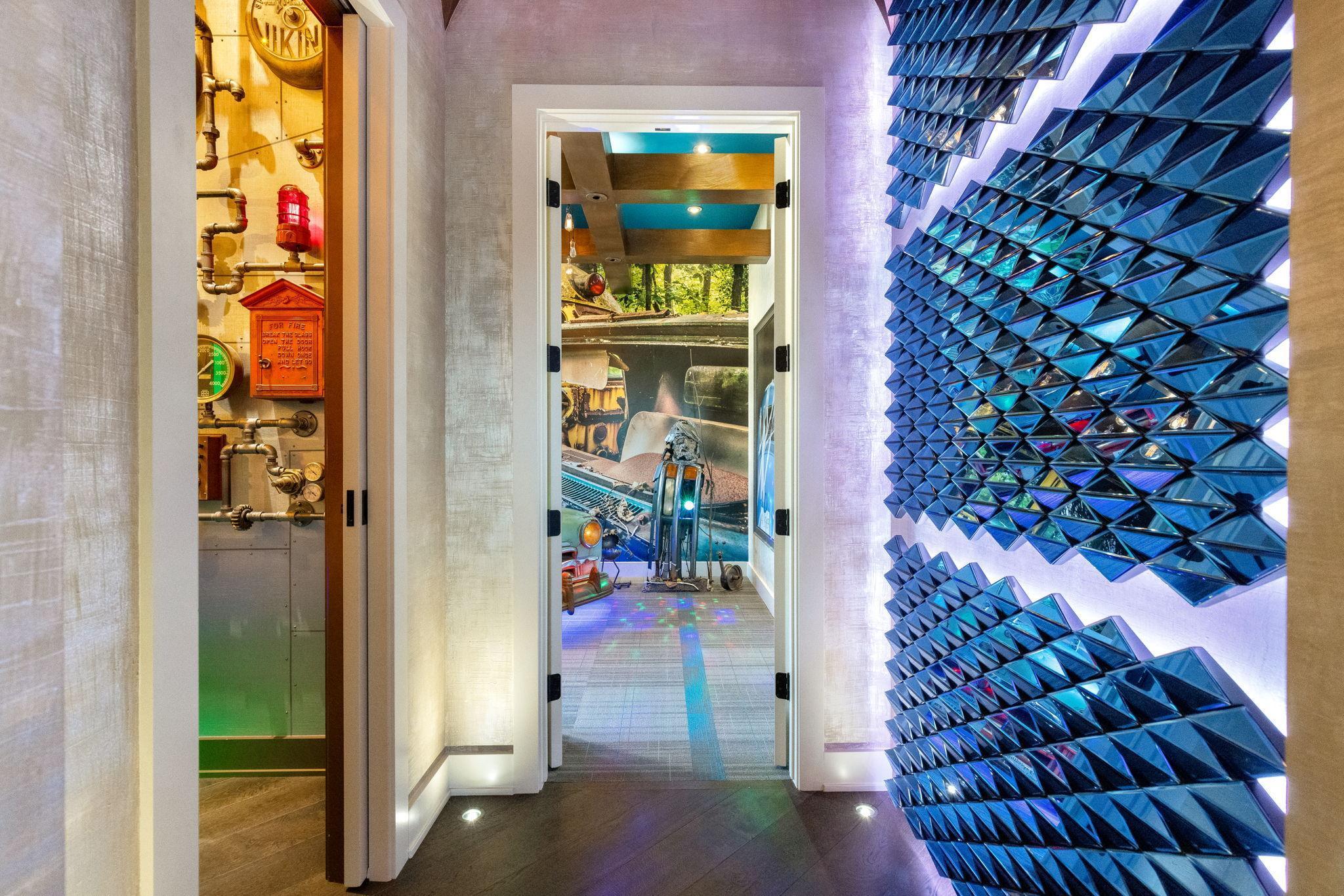 There are custom wall art installations, prints, textures and paint throughout.