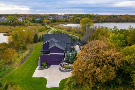 The lot has been beautifully landscaped with mature trees placed for surrounding privacy.
