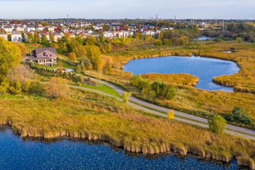 The home overlooks it's private pond along with Pomerleau Lake.