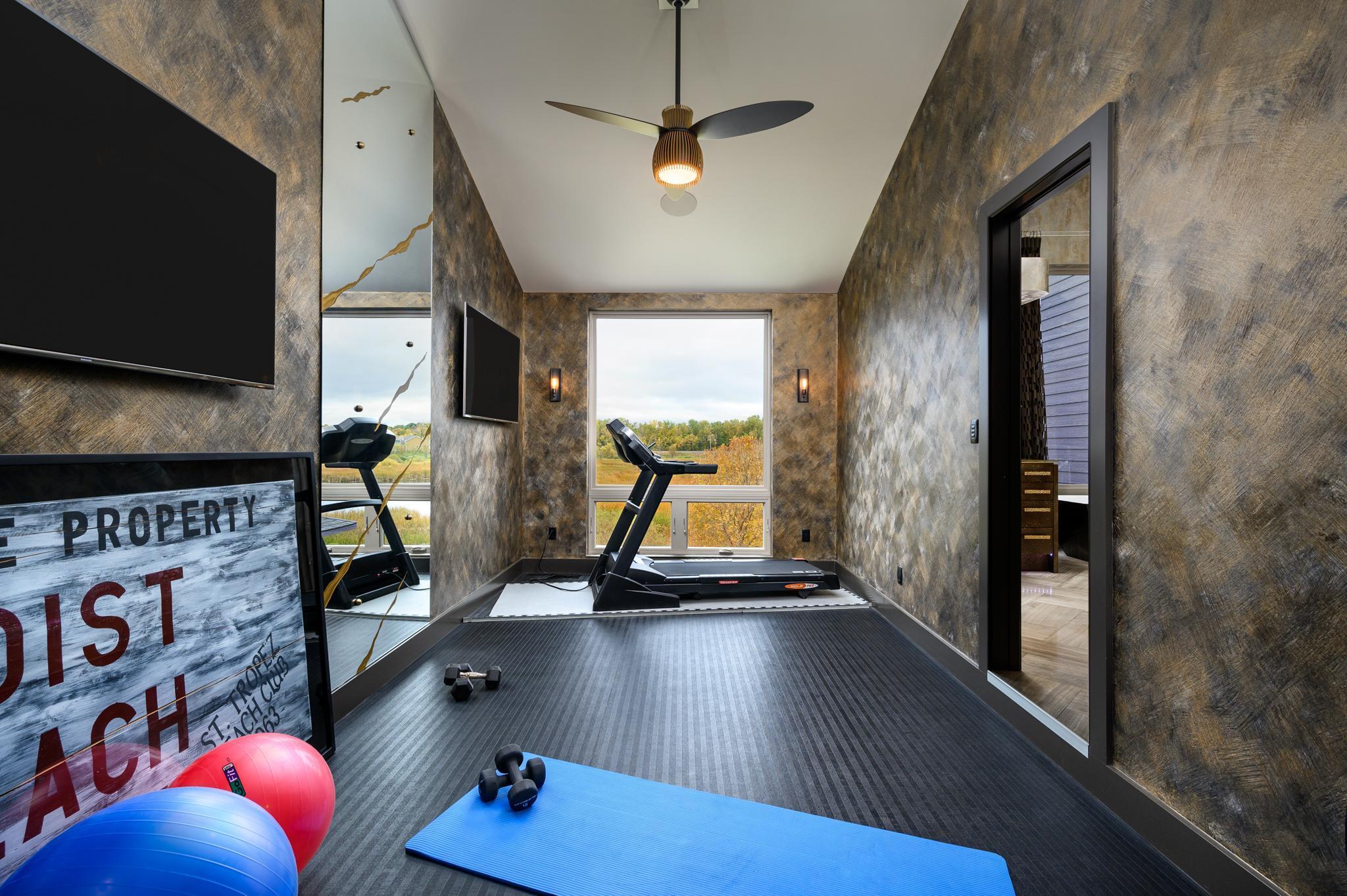 Enjoy your own private exercise room through the primary bathroom and closet.
