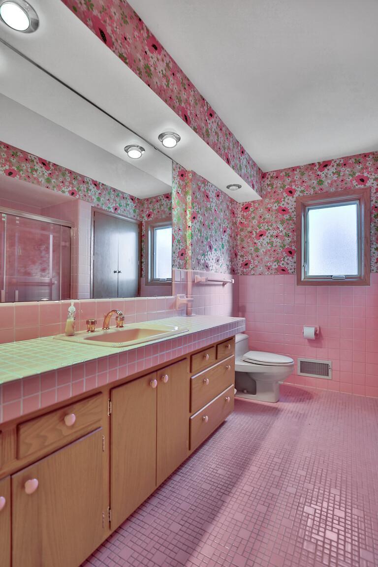 Original ceramic, fixtures and wall paper from a time when life was a bit simpler.