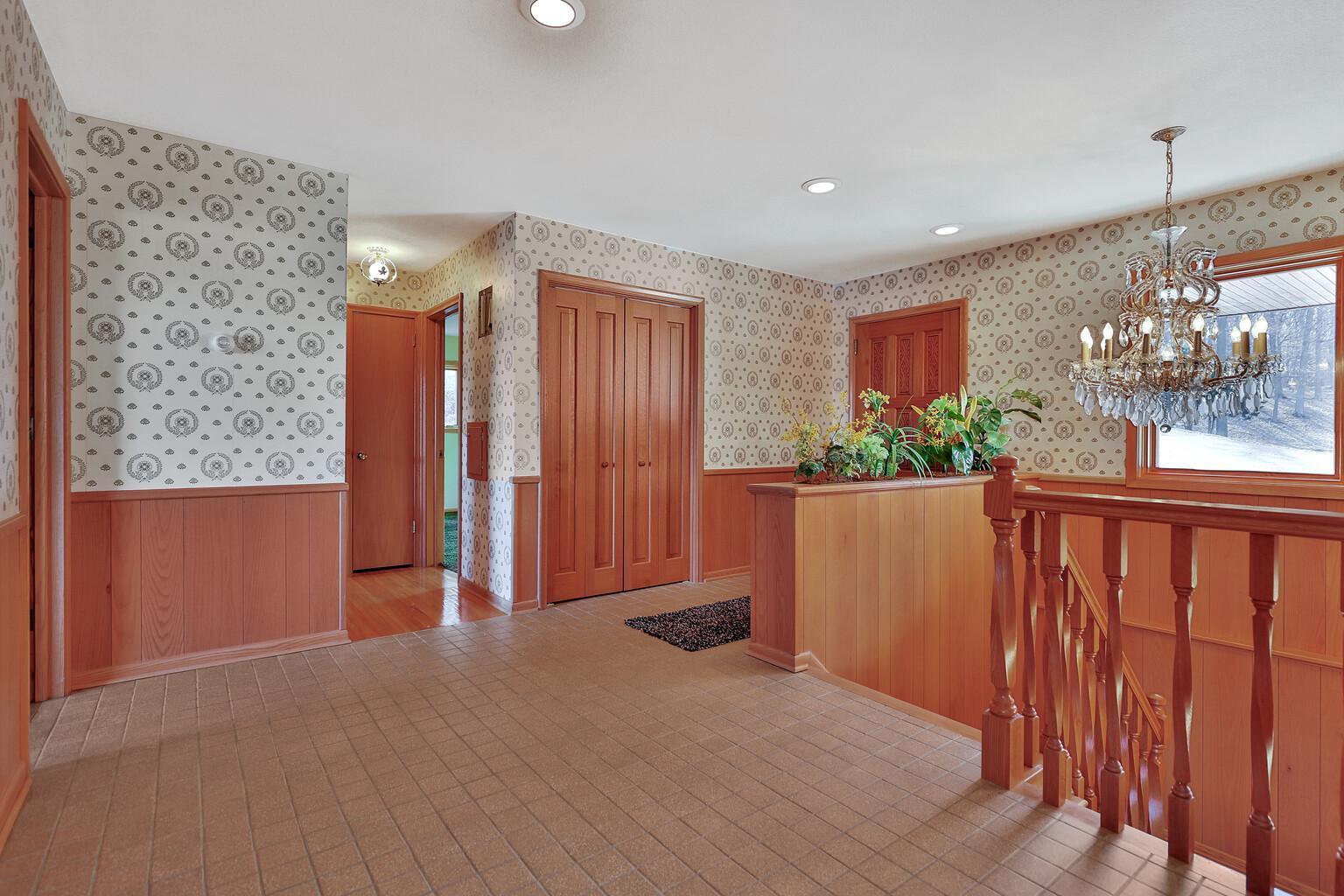 Solid oak doors and large entry closet.