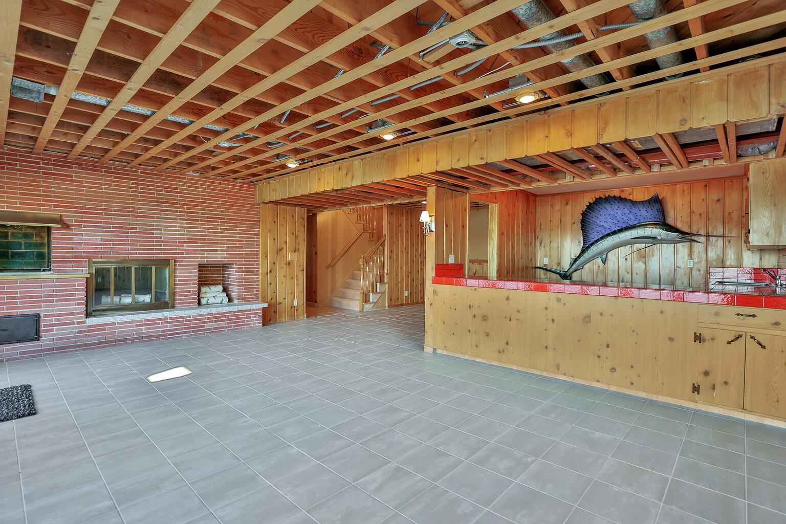 Red/Orange ceramic tile on bar top.