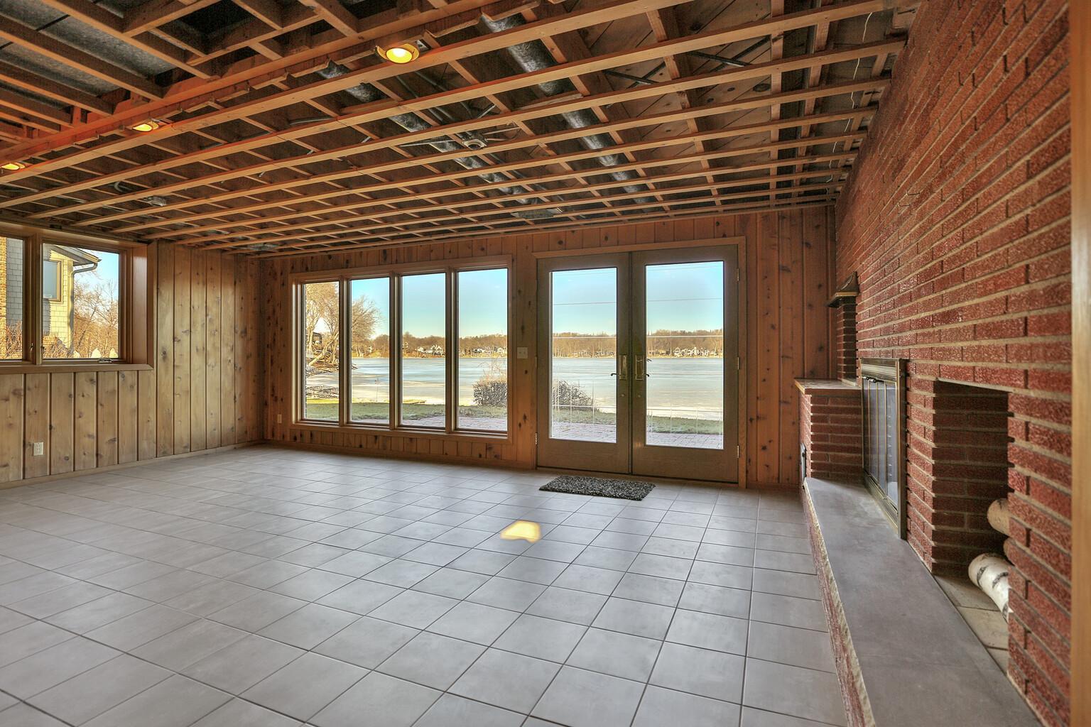 Red brick (Floor to ceiling) Fire Place, Wood Grill and Wood Storage.