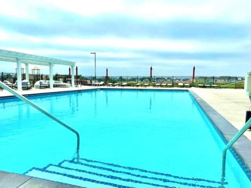 Relax pool side, community pool is now open..jpg