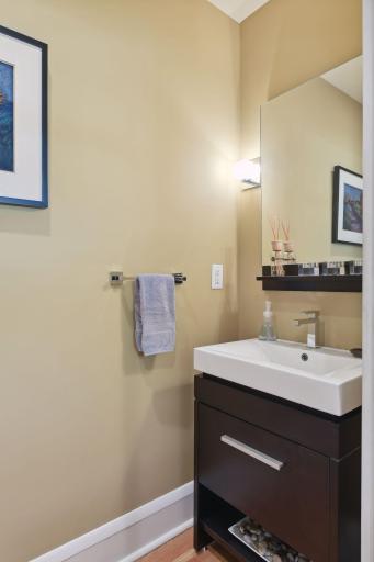 The main level powder room is all updated with quality fixtures and feel like new.