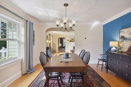 Just steps off the kitchen, there is a formal dining room that can accommodate large gatherings if desired, and has a sense of quaintness if set for smaller settings.