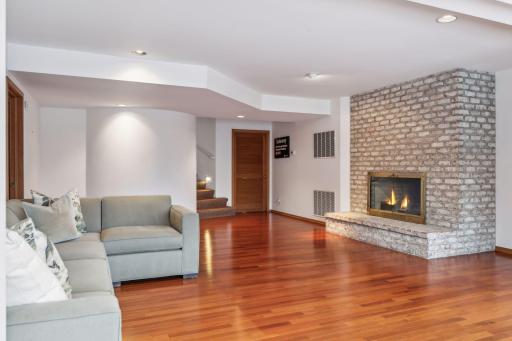 Wood Burning Fireplace and Access to Bedroom and/or Exercise/Office Space