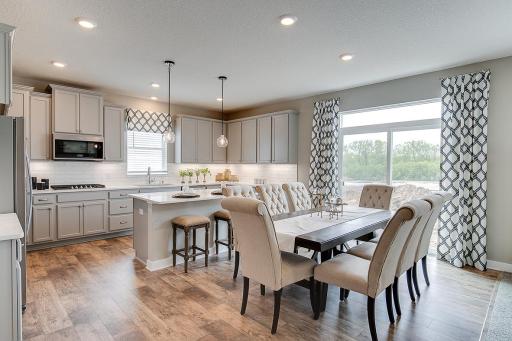 One of the first things you'll notice is our attention to detail throughout the layout, especially in the kitchen! Photo of model home, color and options will vary.