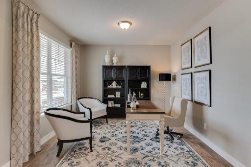 This well designed floor plan provides multiple options including large flex room, a formal dining room, an additional sitting room, a toy room or just about anything else you can think of! Photo of model home, color and options will vary.
