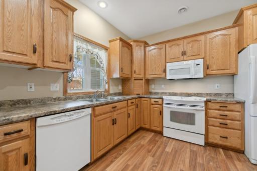 Kitchen has built cabinetry by a local cabinet shop. Quality construction throughout the home.