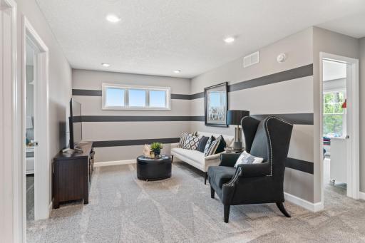 This home has features that will accommodate growth such as this game room. Enjoy separate space for everyone's specific needs. (*Photo of decorated model, actual homes colors and finishes will vary)