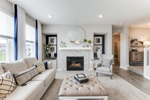 Natural light in abundance through the family room windows. *photo of model home