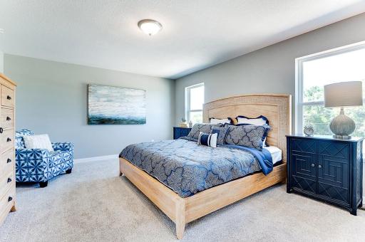 The spacious master suite has room for a king bed + additional furniture - make the space your personal oasis! Model photo. Options and colors will vary.