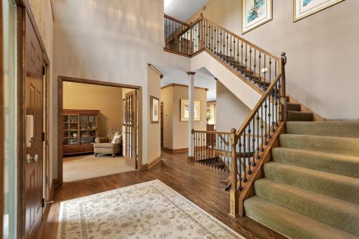 Welcome in to your large foyer and grand entrance to the upstairs