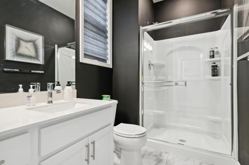 Photo for 650 151st Lane NW, Andover, MN 55304 - Listing #6482757 The spacious main level bath provides plenty of space for everyone to get ready during those busy mornings. (*Photo of decorated model, actual homes colors and finishes will vary)