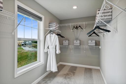 Photo for 650 151st Lane NW, Andover, MN 55304 - Listing #6482757 This owner’s suite features an incredible walk-in closet (*Photo of decorated model, actual homes colors and finishes will vary)