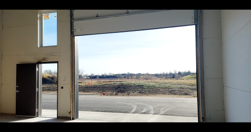 Standard 14 ft garage door and commercial service door