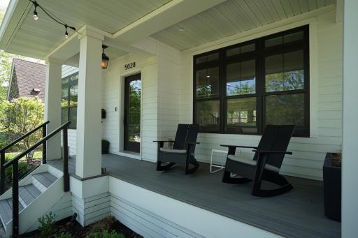 Enjoy morning coffee on the front deck or afternoons waving to passing neighbors in this wonderful neighborhood.