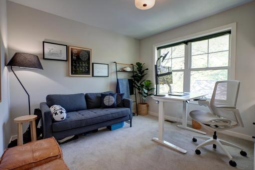 One of the four upper bedrooms, currently used as an office.