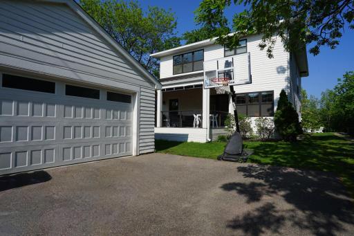Extra large 2+ car garage with convenient service door.