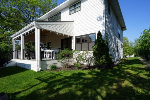 Landscaped, flat back yard for playtime and entertaining.