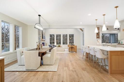 Kitchen, dining room and family room all open to each other and are perfect for entertaining