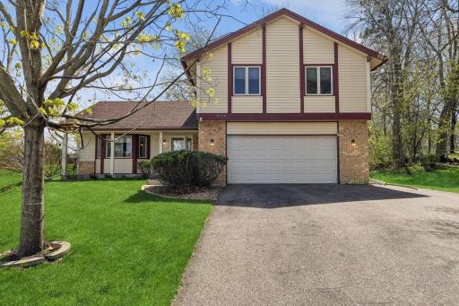 Great curb appeal + extra wide driveway accommodates a third vehicle