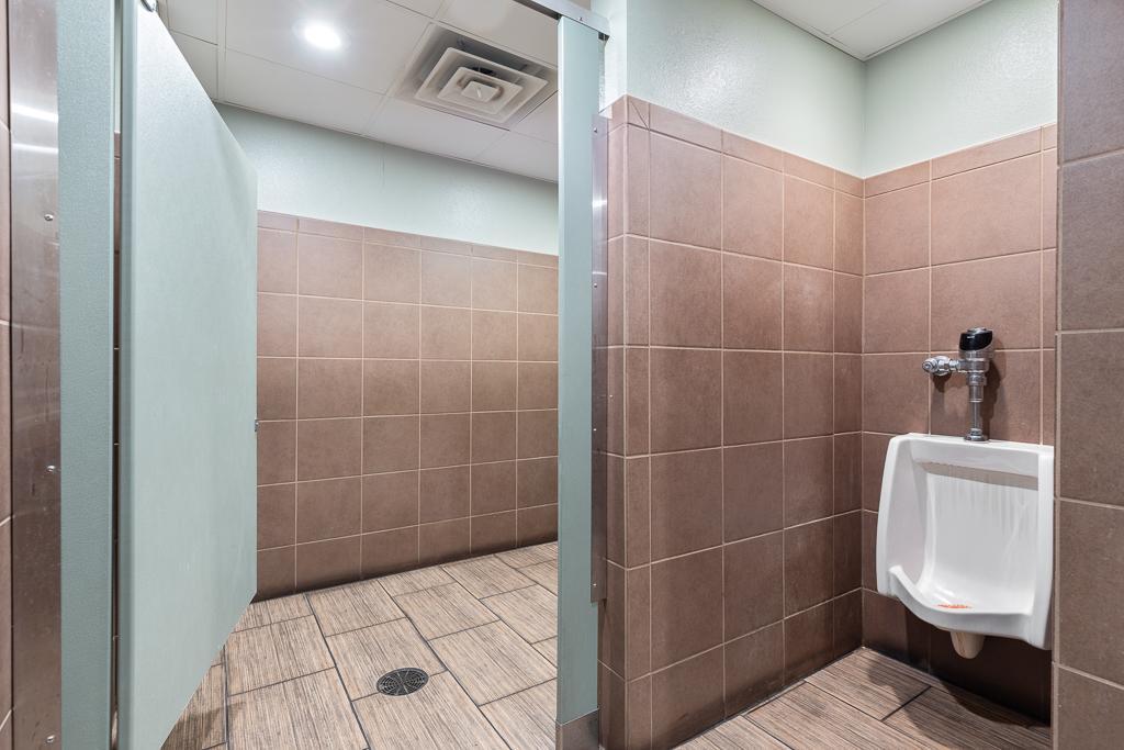 The men's restroom also has a handicap accessible stall