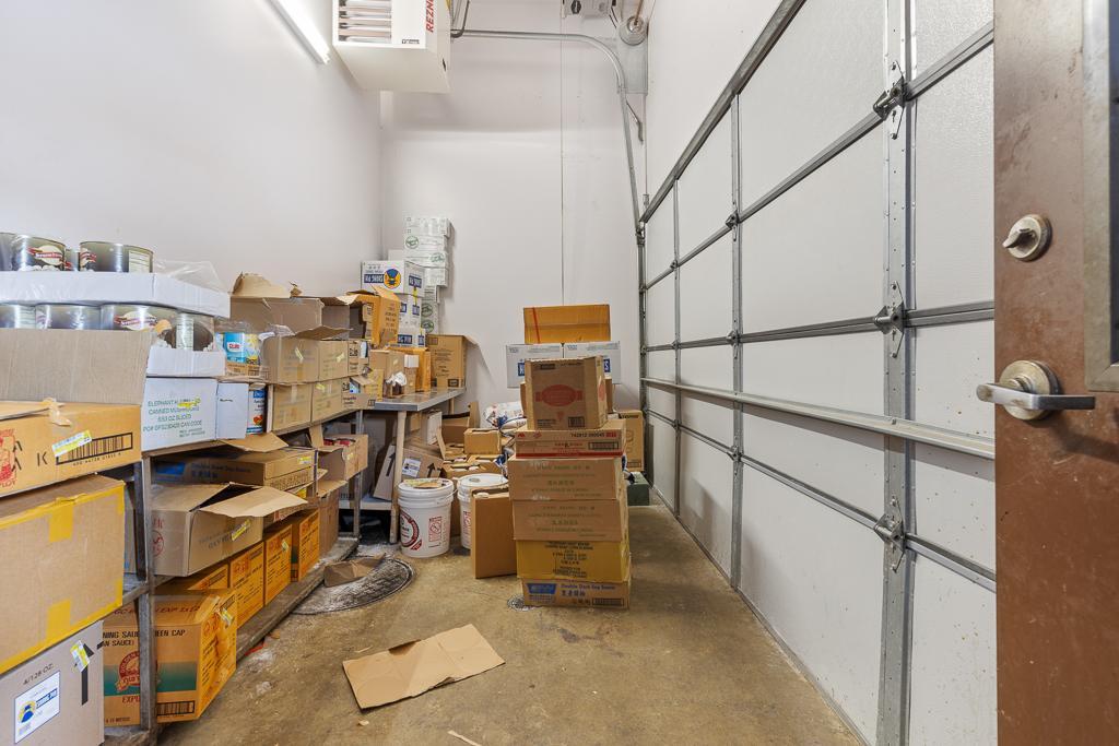 Garage door access from the rear side of the building provides great access for receiving supplies