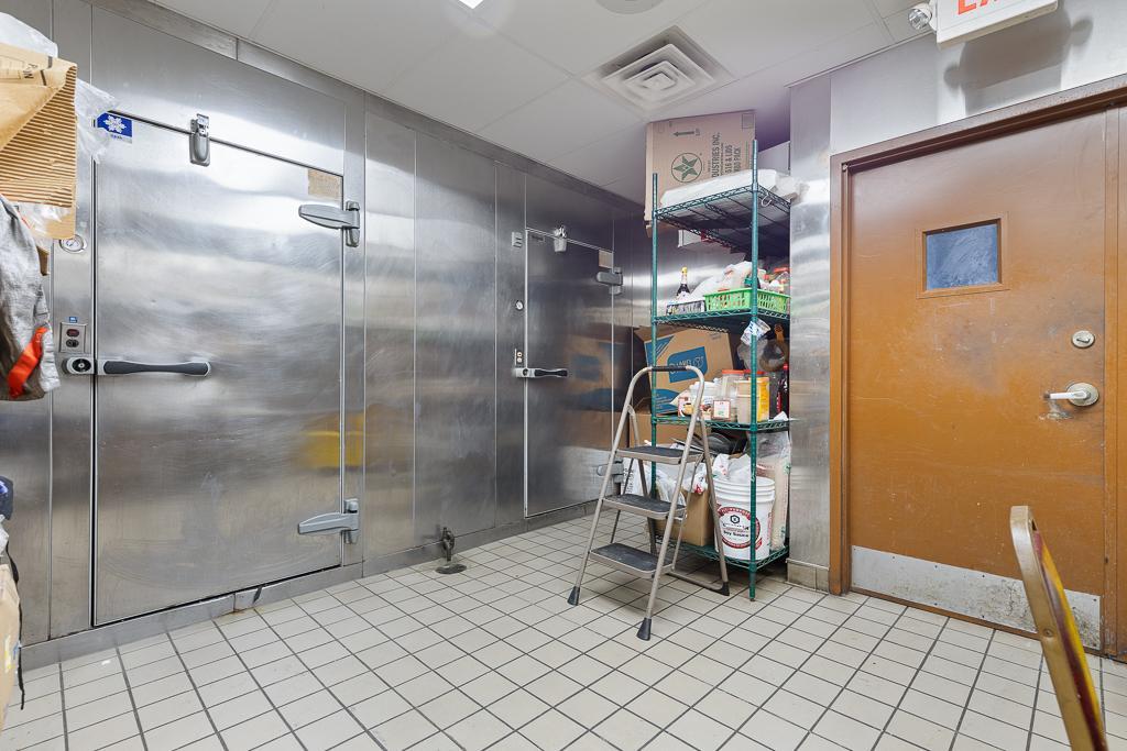 The walk-in cooler and freezer provide ample storage for produce