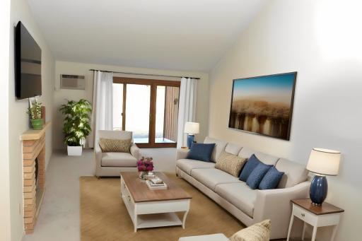 Living room with Brick Fireplace