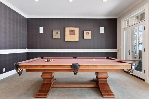 Pool table area with stone tops for beverages
