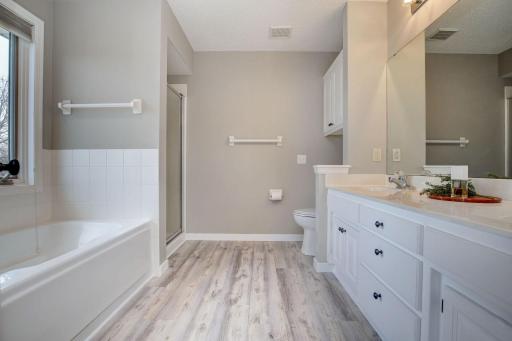 New flooring, paint and more. This spa-like bathroom is the perfect retreat at the end of the day.
