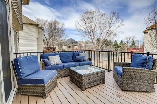 Maintenance free deck with spectacular views to the backyard and pond. Enjoy your favorite beverage in the evening while discussing the days events.