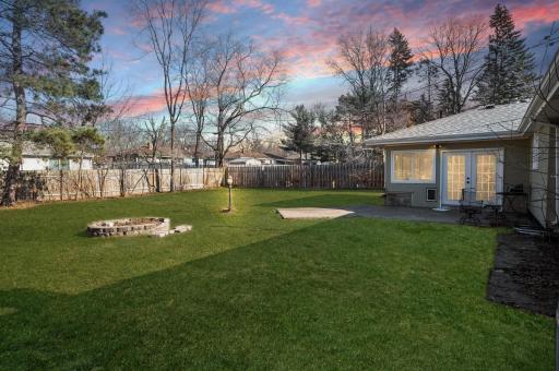 Setting on a 1/4acre lot, with a sprawling, fully fenced back yard.