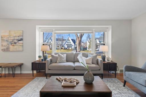 Large windows make the living room feel bright and open.