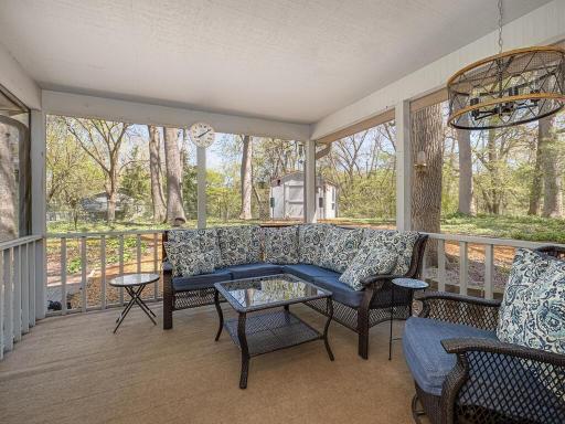 Screened porch, located off kitchen. This is a room you will live in!!