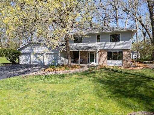 Nestled in an established Eden Prairie neighborhood with winding streets and mature trees, this traditional home offers timeless charm and thoughtful updates.