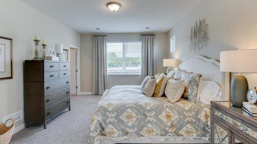 Photos are of floor plan of former model home. Options and color selections will vary. Owner suite bedroom with 2nd closet