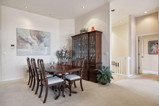 Spacious Formal Dining with recessed lighting,